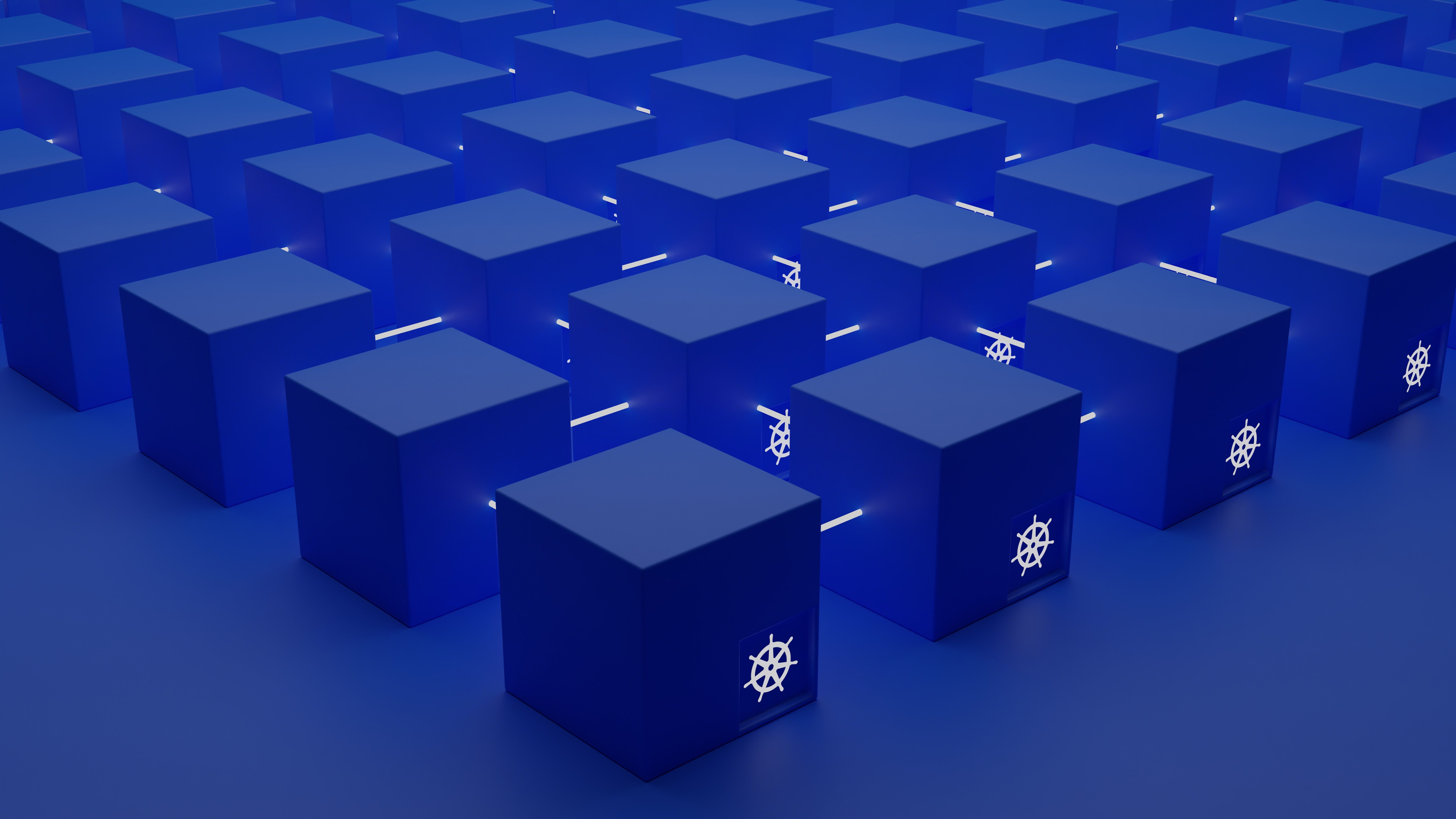 a group of boxes with the logo of Kubernetes connected together, illustrating the ability of Kubernetes to scale up and manage multiple worker nodes in a cluster